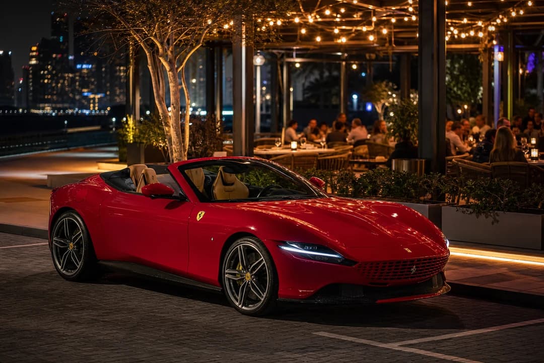 Porsche 911 Turbo S Cabriolet at a Bluewaters Island restaurant valet for waterfront dining weekend drives