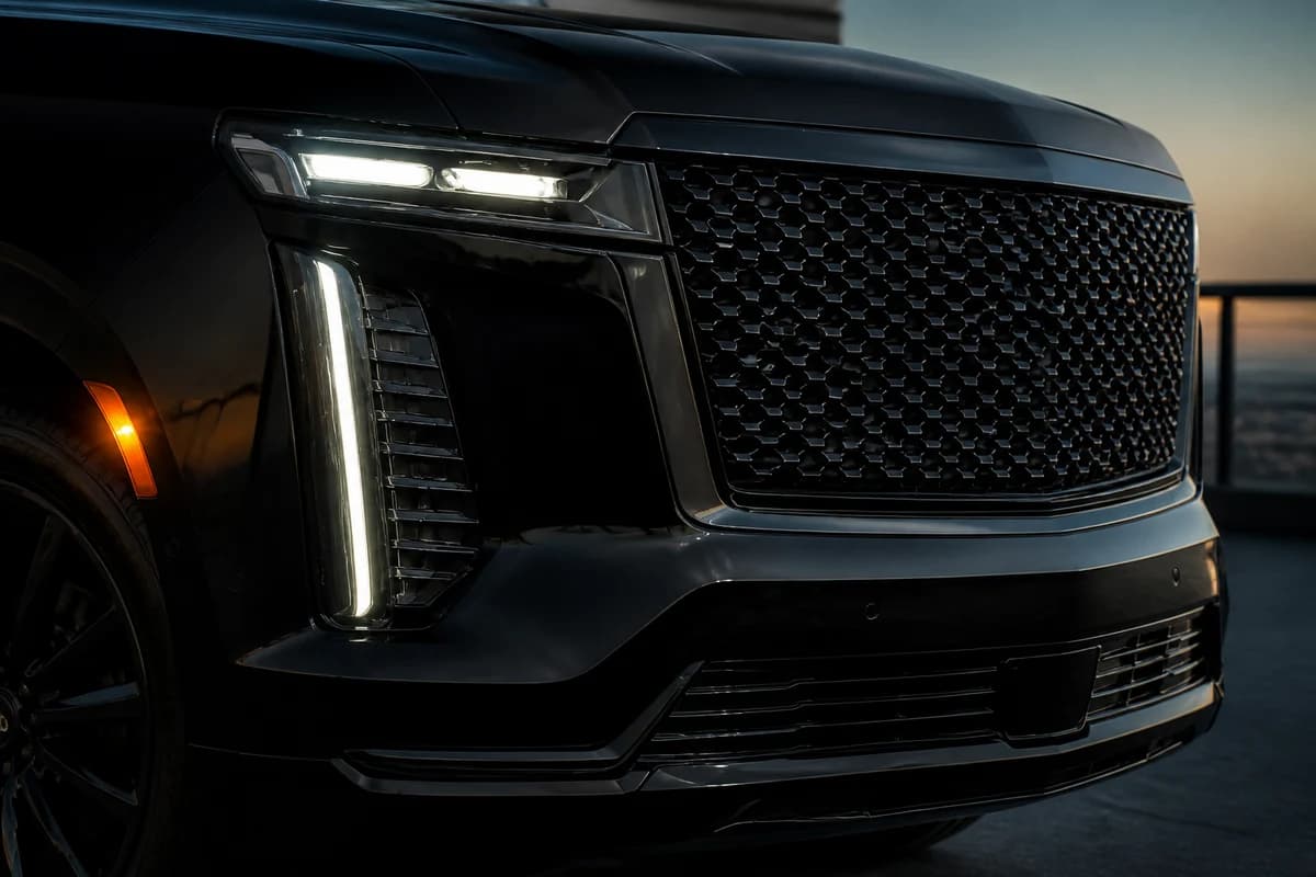 Cadillac Escalade grille and vertical light signature detail for exotic car rental Dubai presence