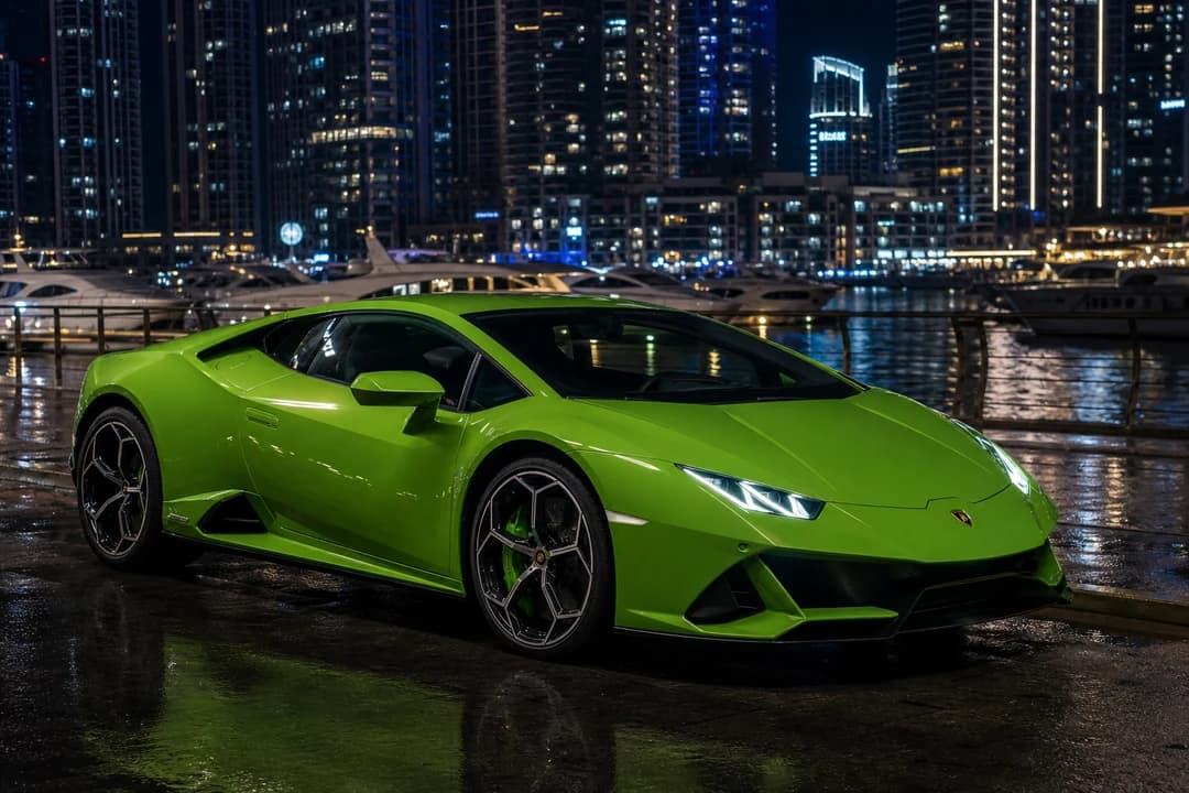 Lamborghini Huracán coupe on Dubai Marina promenade for supercar rental Dubai evening plans