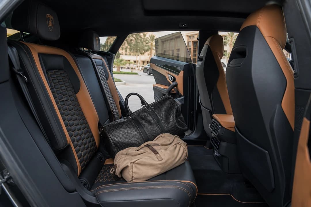 Lamborghini Urus rear cabin leather seats for best luxury car Dubai passenger comfort with guests