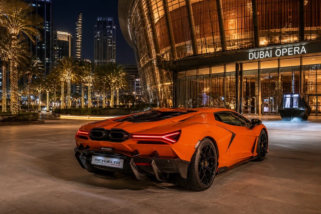 Lamborghini Revuelto at Dubai Opera at dusk for event-led Lamborghini hire Dubai