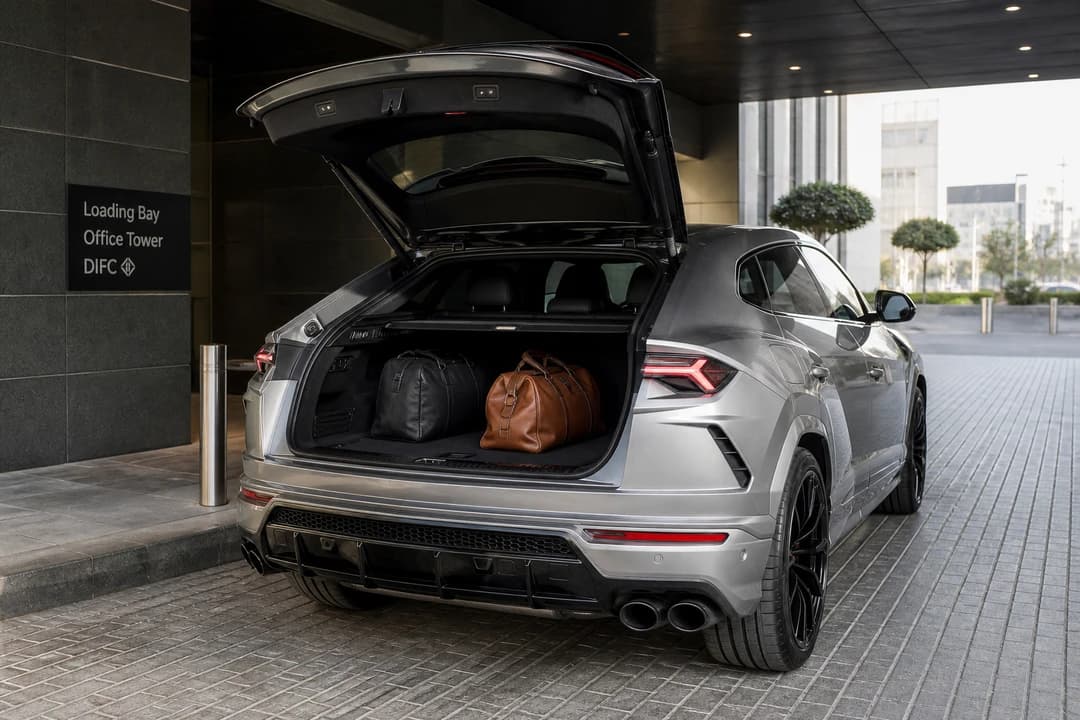 Lamborghini Urus hatch with soft bags at DIFC for luxury car rental Dubai city plans