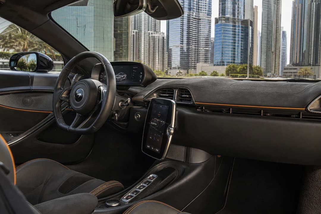 McLaren Artura cockpit for McLaren hire Dubai first-timers with the folding driver display open in daylight