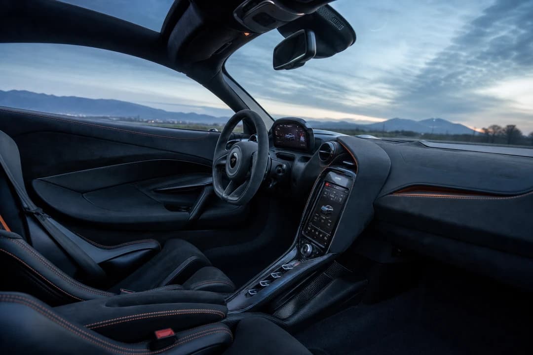 McLaren 720S carbon cockpit at dawn for supercar rental Dubai exotic cabin theatre