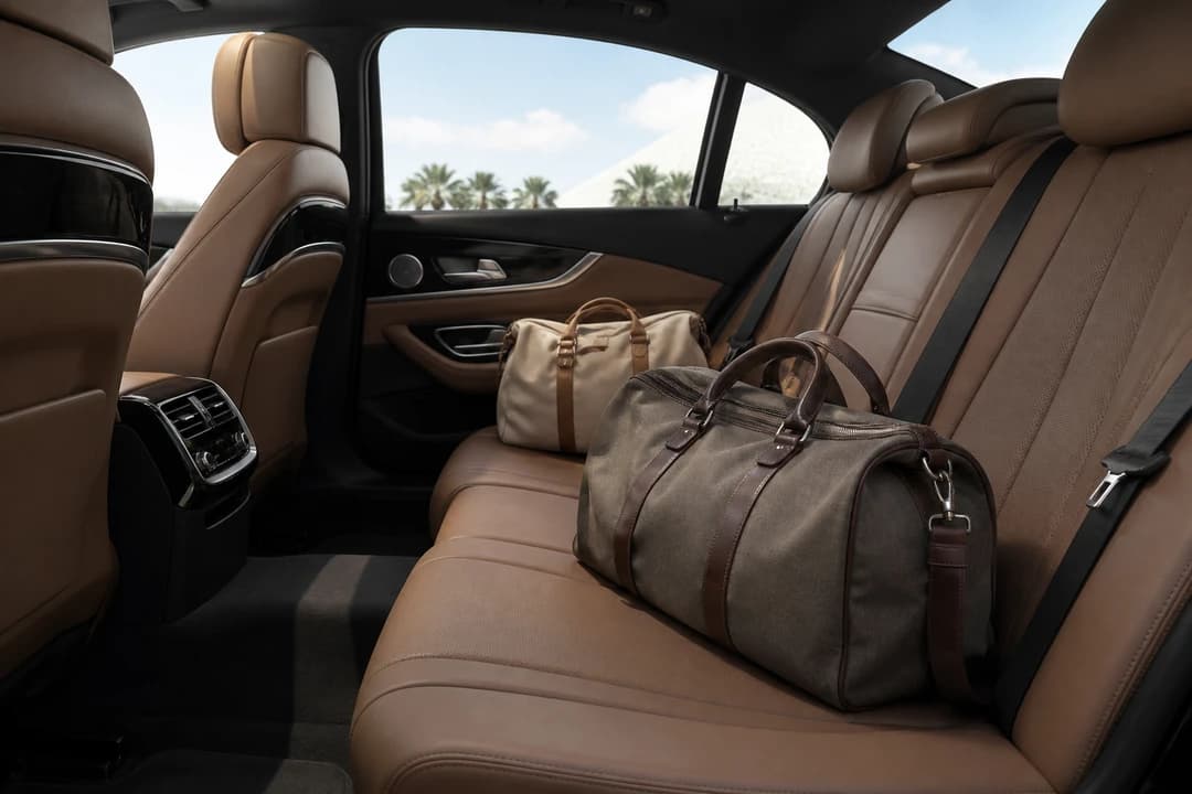 Best cars to rent Dubai for ADGP: calm luxury sedan cabin with soft weekend bags for Yas Island hotel hops