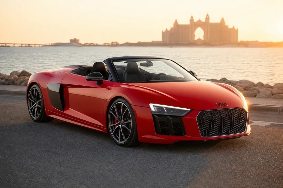 Rent Audi R8 Spyder Dubai: R8 Spyder on a Palm coastal road at golden hour for open-top theatre