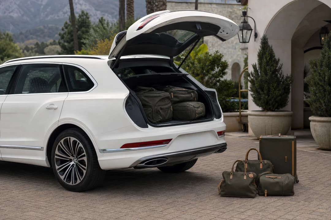 Bentley Bentayga open tailgate with family luggage for five-seat resort and city trips