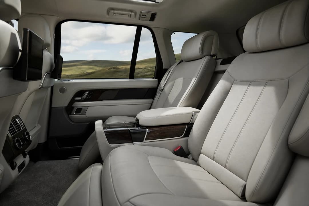 Range Rover rear cabin lounge for best luxury car Dubai calm on a resort transfer week