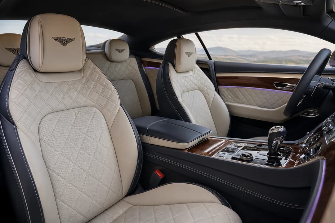 Bentley Continental GT hire Dubai cabin with diamond-quilted leather for four soft-bag adults