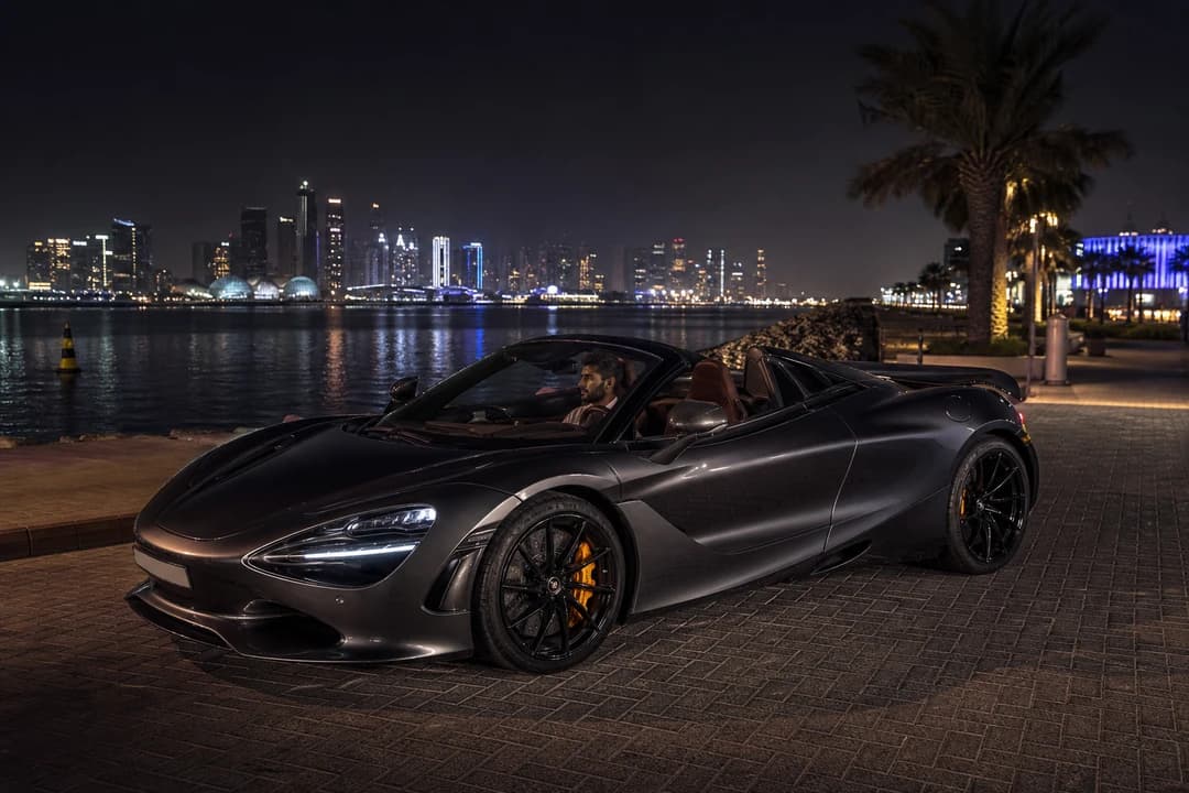 McLaren 750S Spider on the Dubai Harbour promenade at night for best cars to rent Dubai evening plans