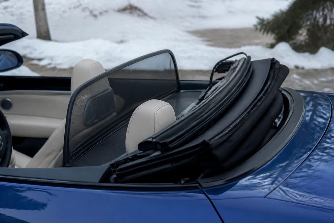 BMW 430i Convertible roof mechanism detail for winter open-top driving from Dubai