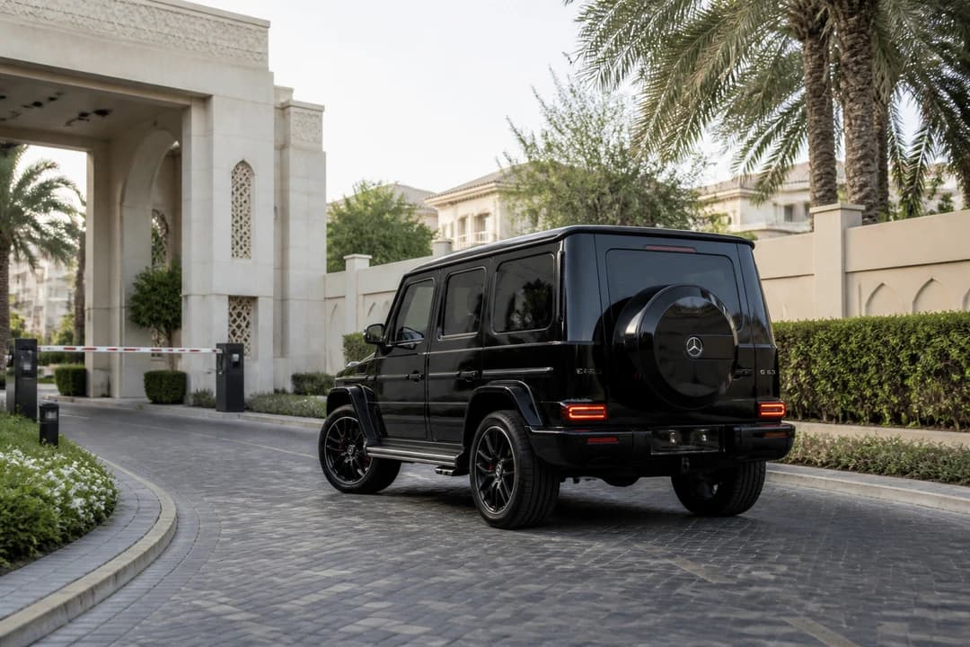Mercedes-Benz G63 at an Emirates Hills community gate for luxury car rental Emirates Hills villa access
