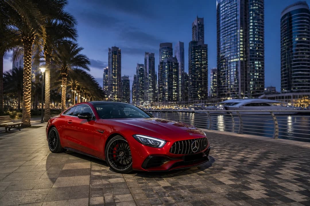 Sports coupe at Dubai Marina in cool winter evening light for supercar rental Dubai guests who actually need usable pace