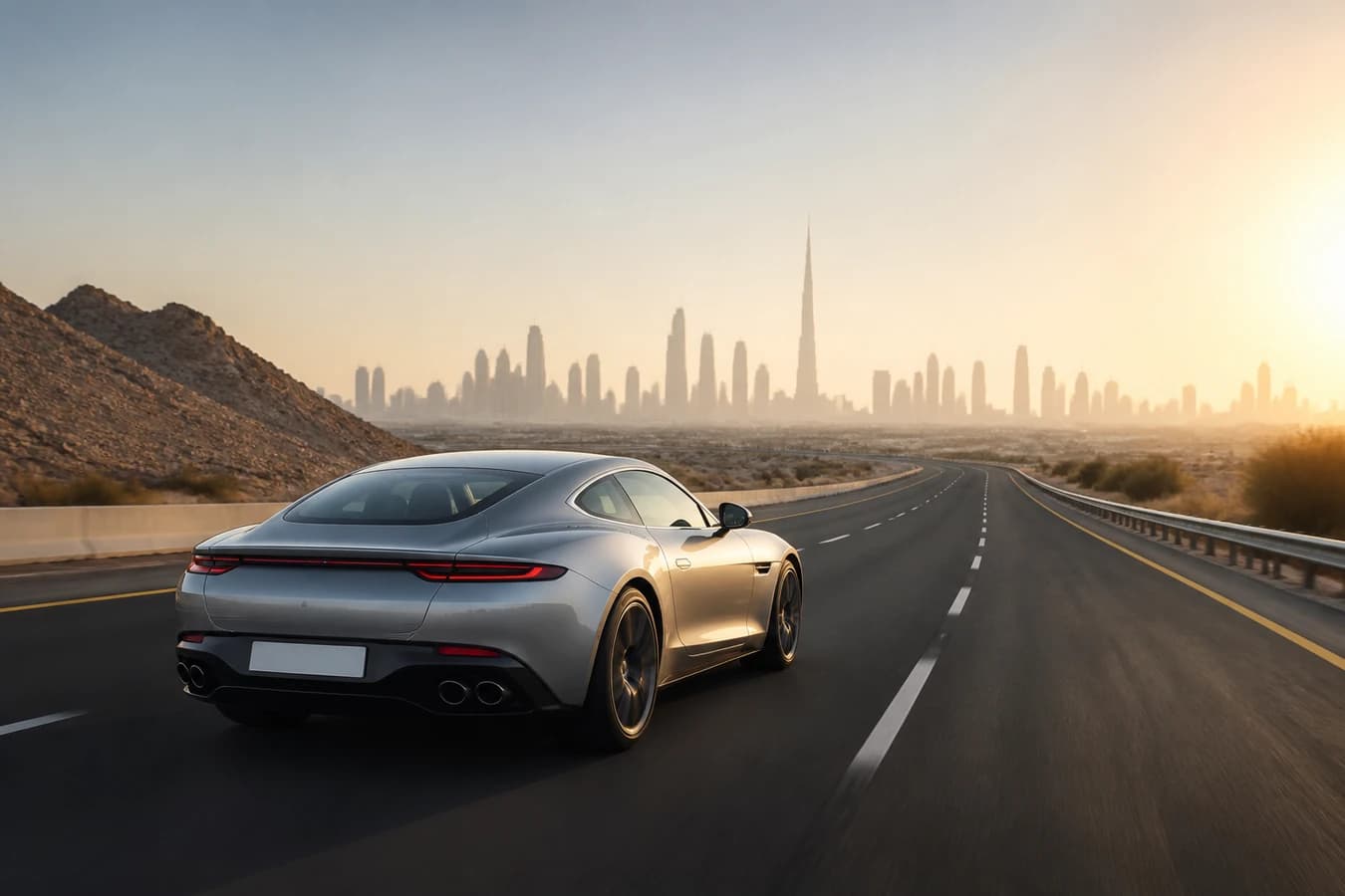 Weekend luxury drive routes Dubai: silver grand tourer on a quiet UAE dual carriageway near Dubai at golden morning light