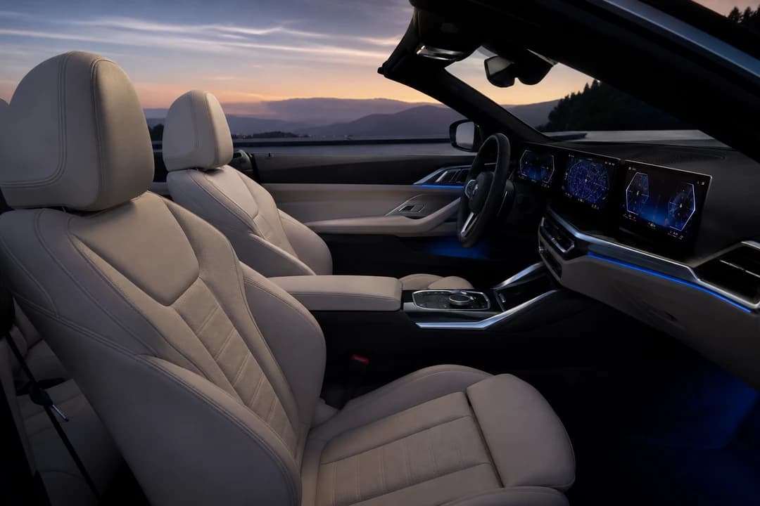 BMW 440i Convertible hire Dubai cabin with four seats and curved displays for couples and light fours