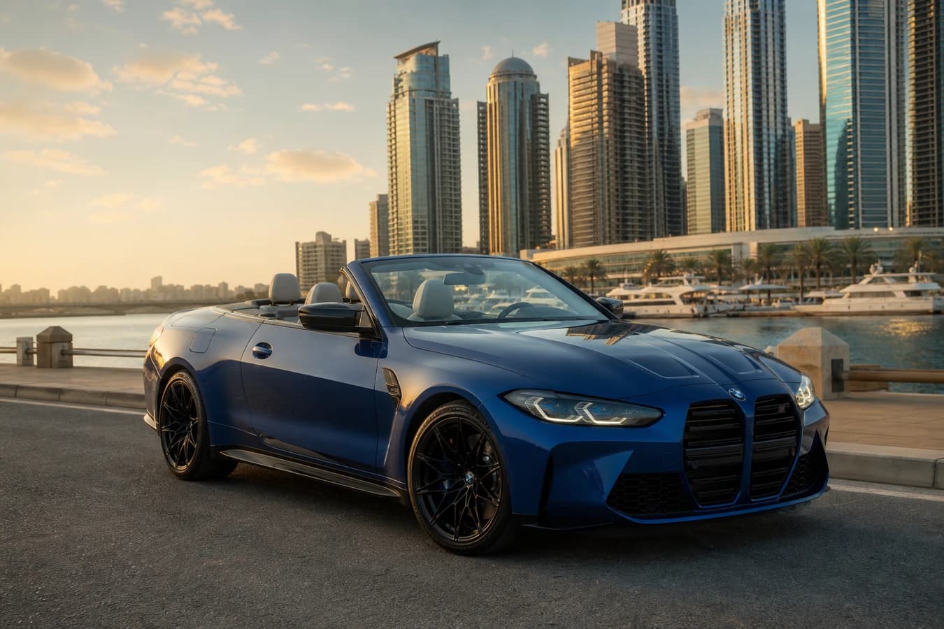 BMW M4 Convertible rental Dubai hero with an open-top M4 on a Marina coastal road at golden hour