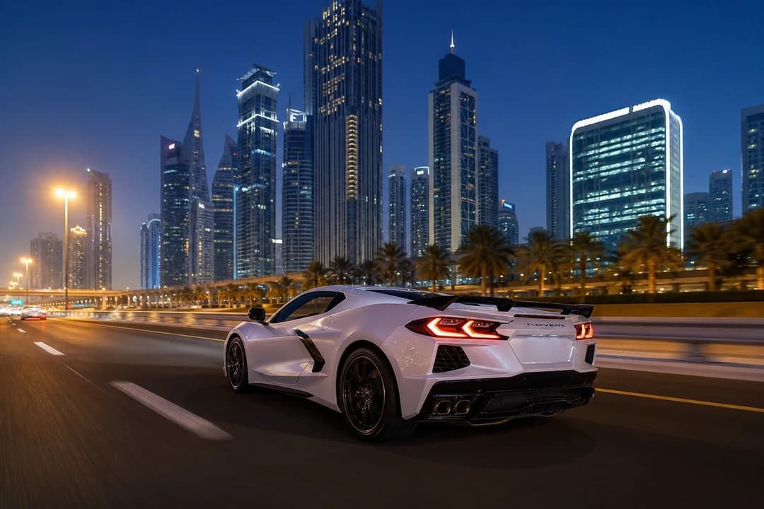 Chevrolet Corvette on Sheikh Zayed Road at blue hour for exotic car rental Dubai evening loops