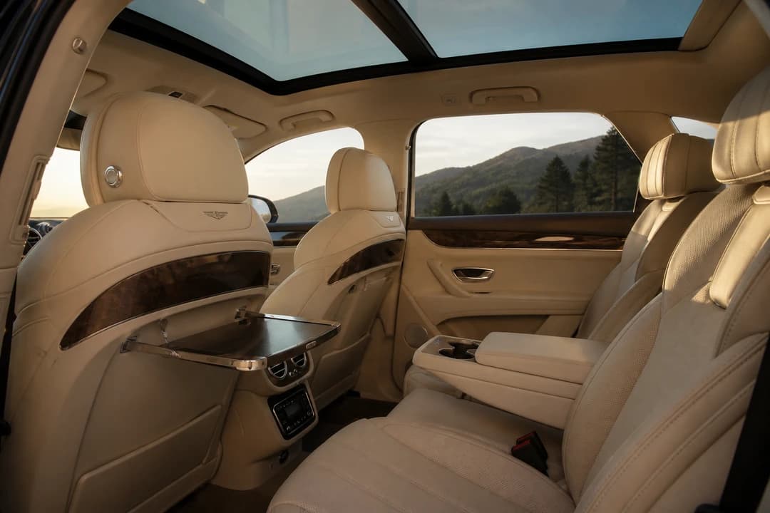 Bentley Bentayga rear cabin leather seats for best SUV rental Dubai family comfort