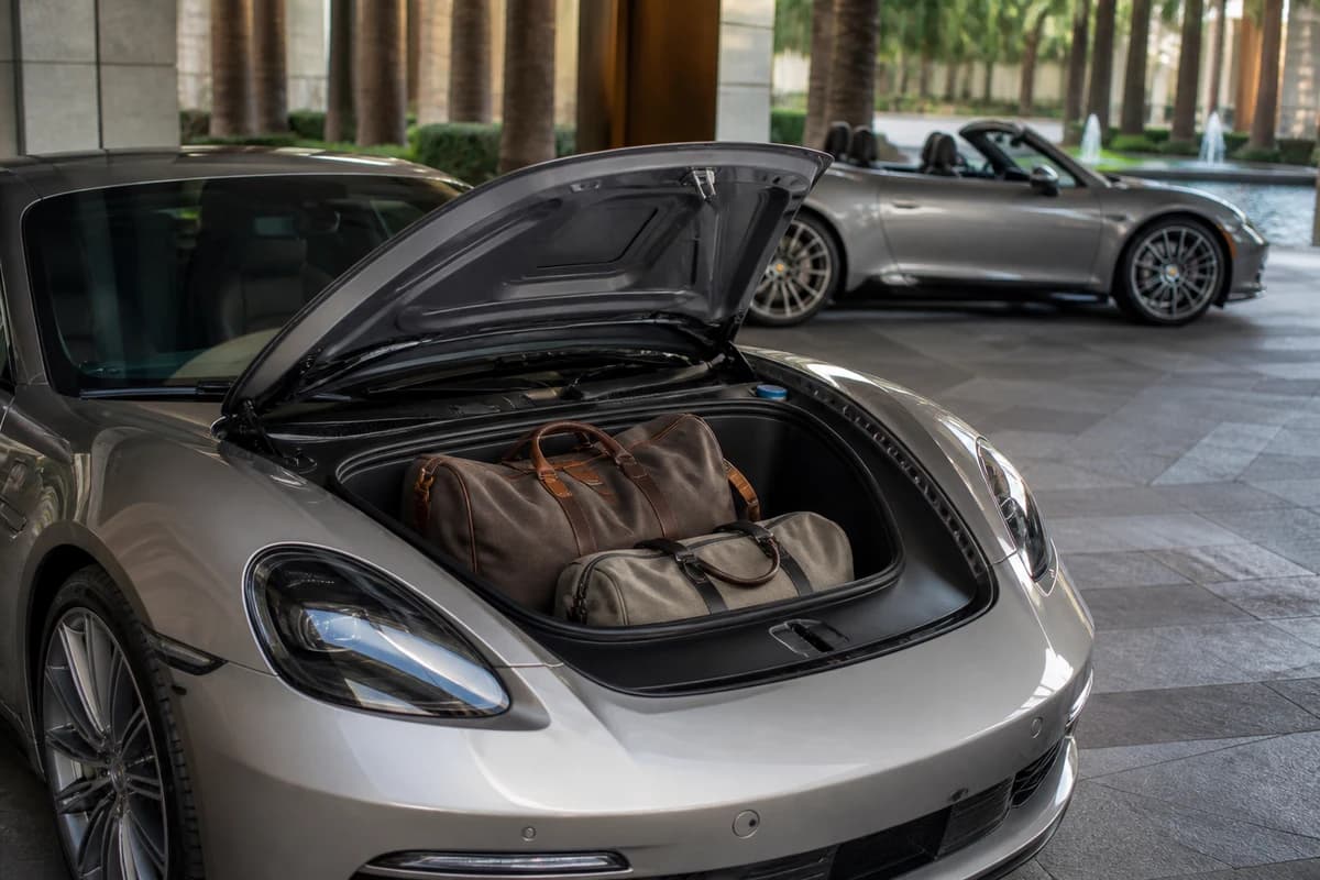 Coupe front boot with soft weekend bags for luxury car hire Dubai packing reality versus convertible