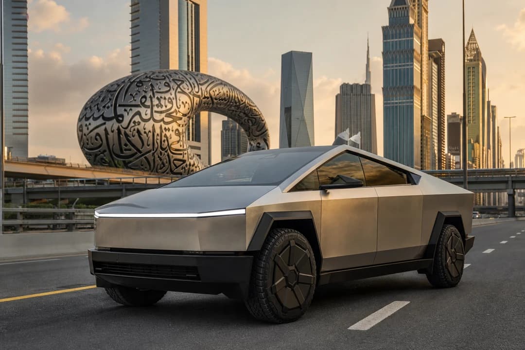 Tesla Cybertruck on Sheikh Zayed Road at golden hour for luxury car comparison Dubai electric presence