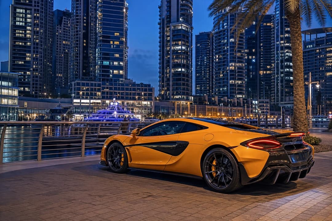 Supercar rental Dubai evening after a week-long SUV hire continuity on Marina Walk