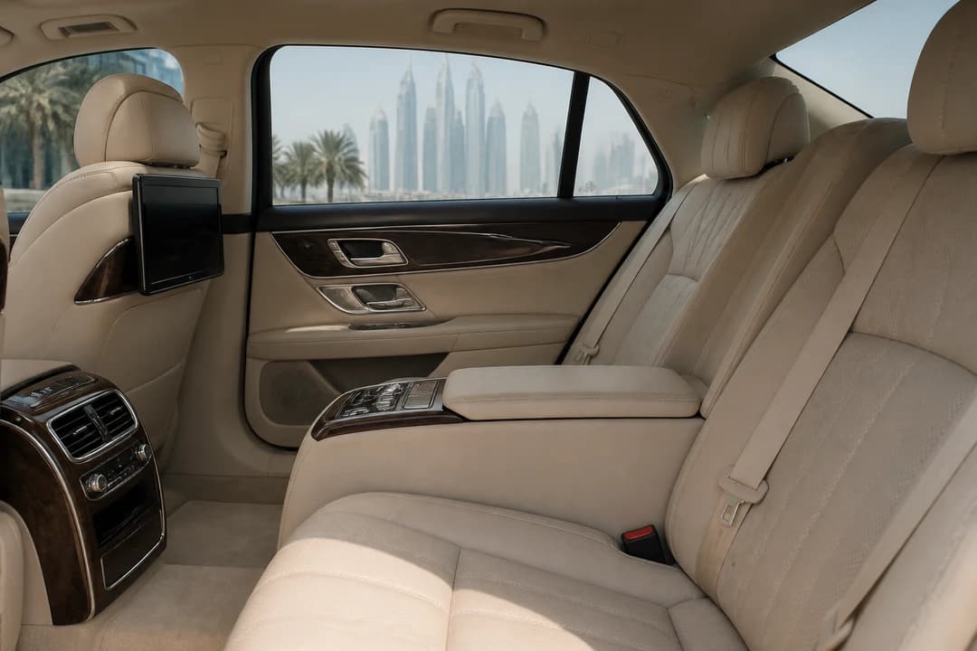 Quiet executive sedan rear cabin for Dubai car hire meetings and airport-to-hotel arrivals