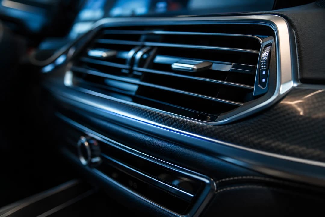 Luxury cabin steering wheel and climate controls for best luxury car Dubai hotel summer cooling