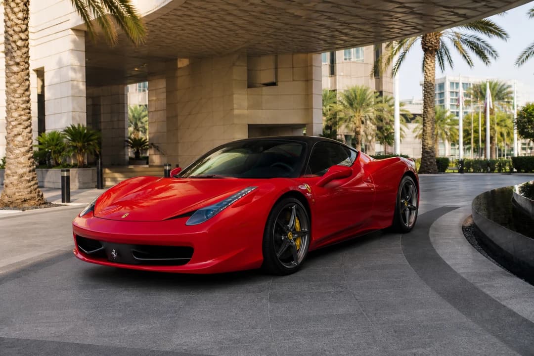 Best cars to rent Dubai for a supercar UAE road trip rental: coupe at an Abu Dhabi hotel porte-cochère