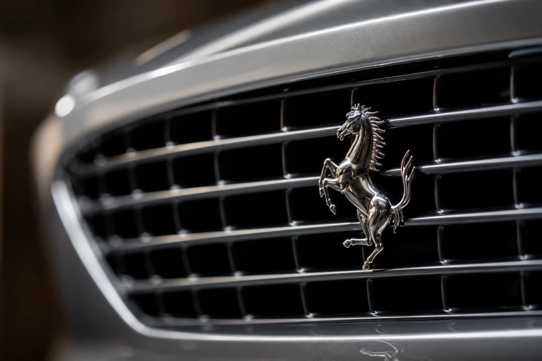Ferrari Prancing Horse badge and Roma grille detail for Ferrari Roma rental Dubai identity