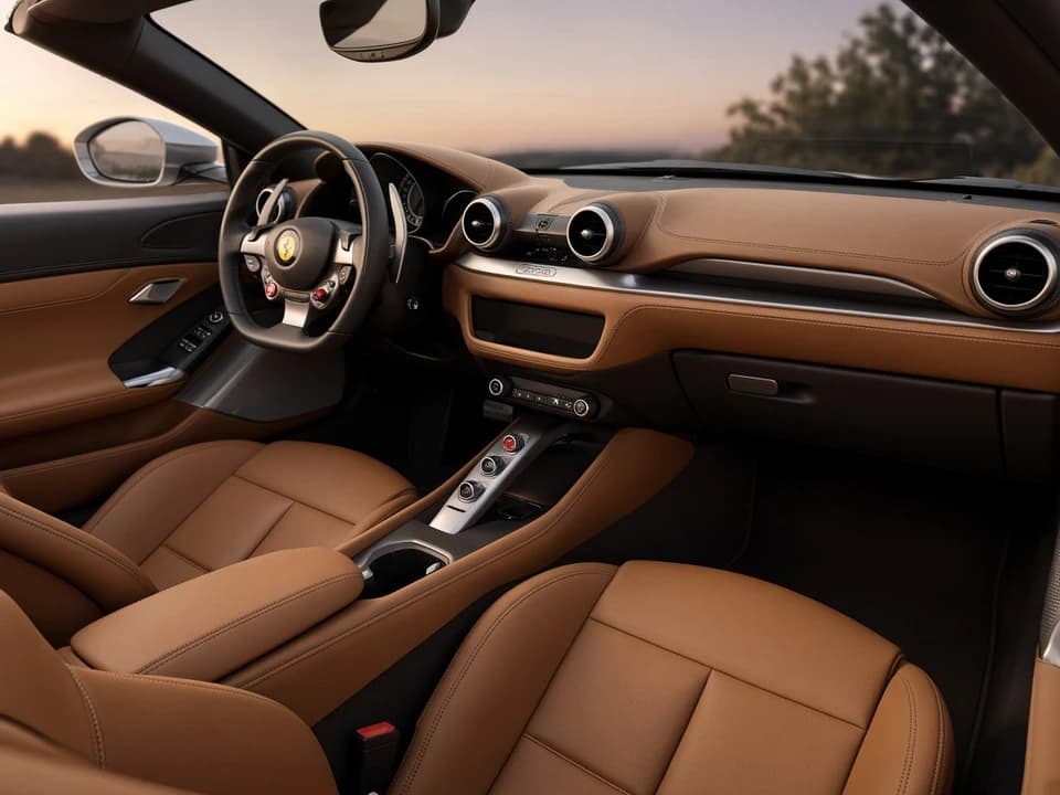 Ferrari Portofino rental Dubai cabin with leather seats ready for a couple evening convertible drive