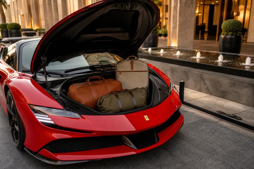 Ferrari SF90 Spider front luggage space with weekend bags for a two-seat celebration trip