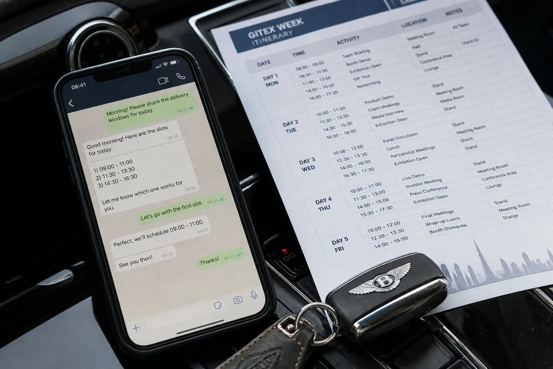 WhatsApp delivery windows and GITEX itinerary on a luxury dashboard before morning hall drop-off