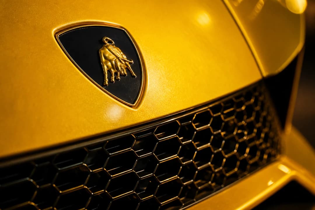 Lamborghini bull badge and hexagonal grille detail for Lamborghini Huracan vs Aventador rental Dubai identity