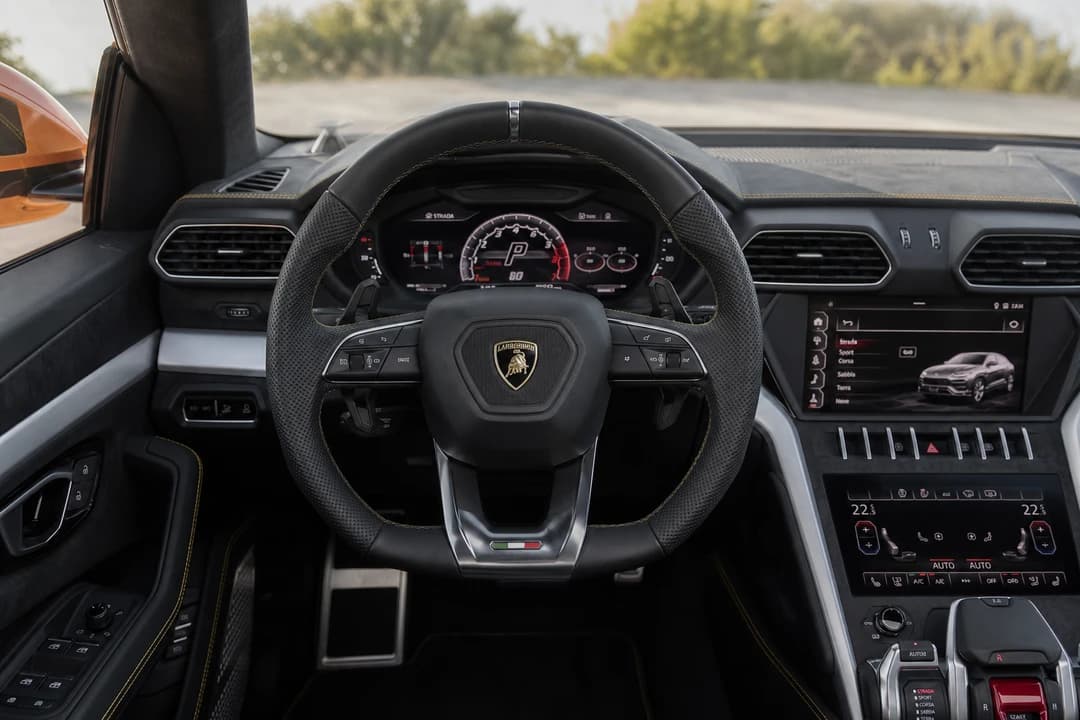 Lamborghini Urus interior driver cockpit with digital dash for busy Dubai city driving