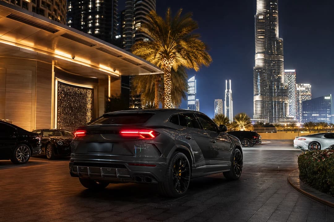 Lamborghini Urus at Downtown hotel valet for supercar rental Dubai guests who still need an SUV
