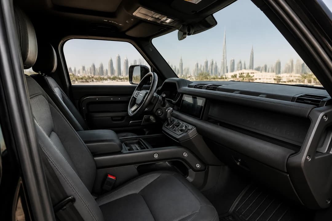 Land Rover Defender hire Dubai upright cabin with clear sight lines for family and villa weeks