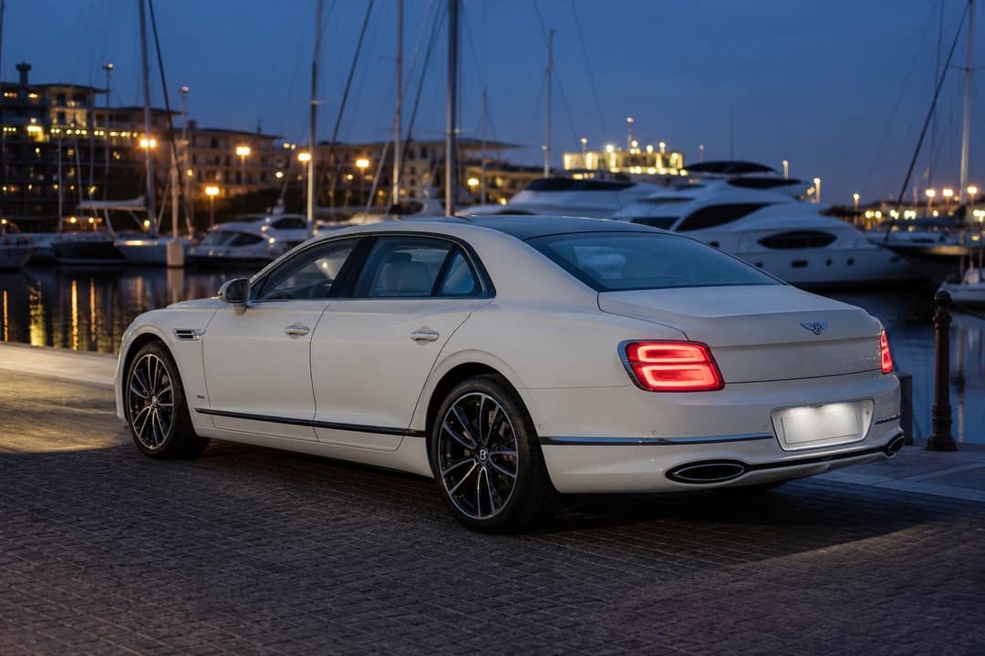 Bentley Flying Spur at a Jumeira Bay marina quay for best cars to rent Dubai evening plans