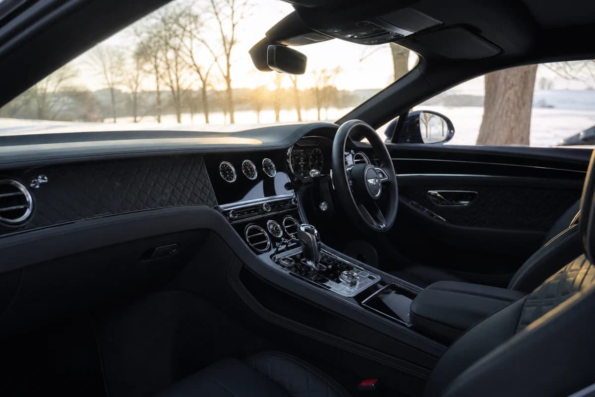Bentley Continental GTC cabin in winter morning sunlight for longer Dubai driving days
