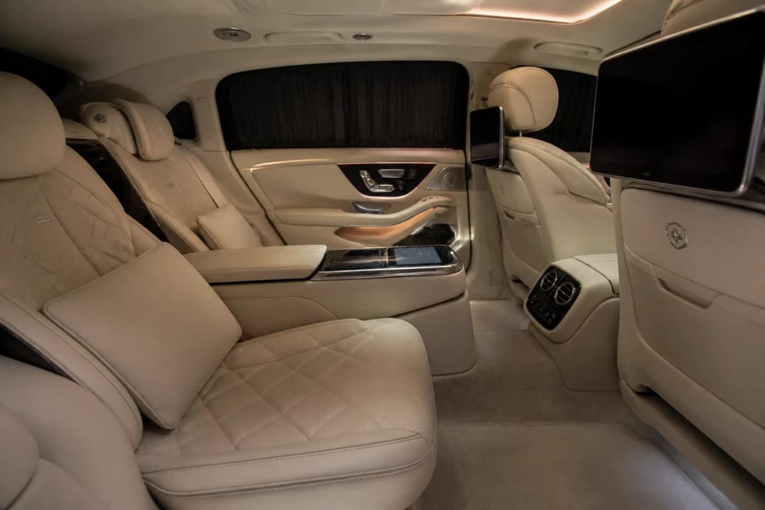 Maybach rear cabin for luxury car rental Dubai VIP exhibition guests between sessions
