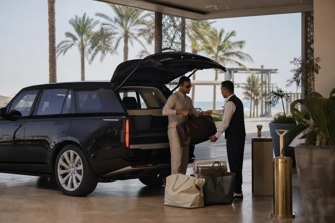 Range Rover Sport hotel handover with soft bags for Jumeirah waterfront car delivery near La Mer