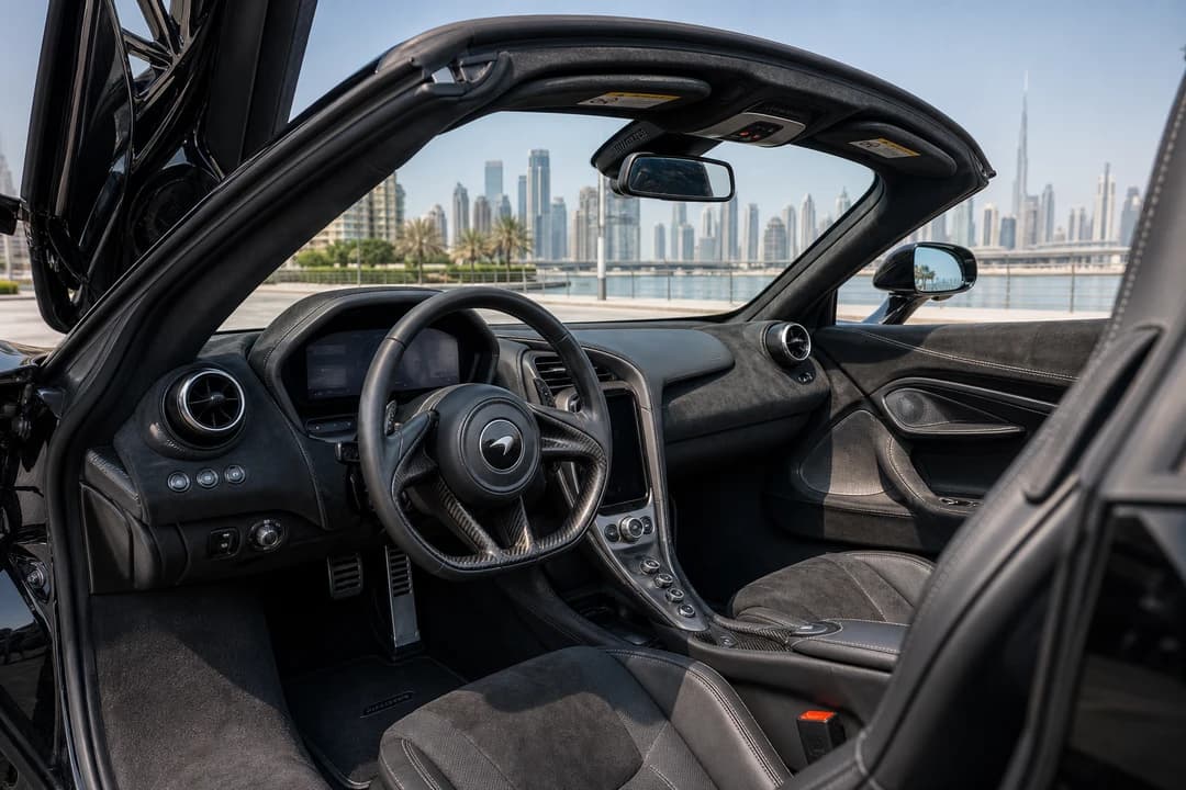 McLaren 720S Spider open-cockpit interior with folding driver display for McLaren car rental Dubai weekends