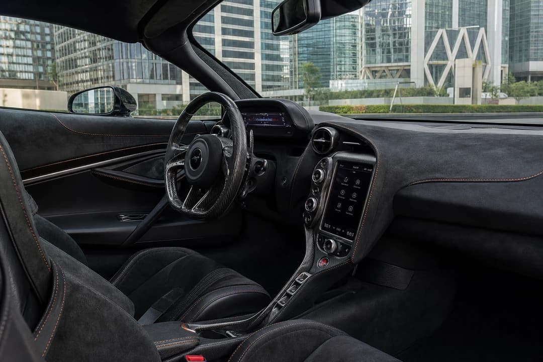 McLaren 720S cockpit with folding driver display for best luxury car Dubai technical evenings