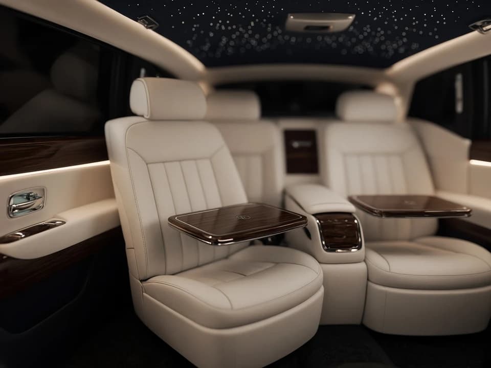 Phantom hire Dubai rear lounge cabin with cream leather and soft ambient light for VIP weeks