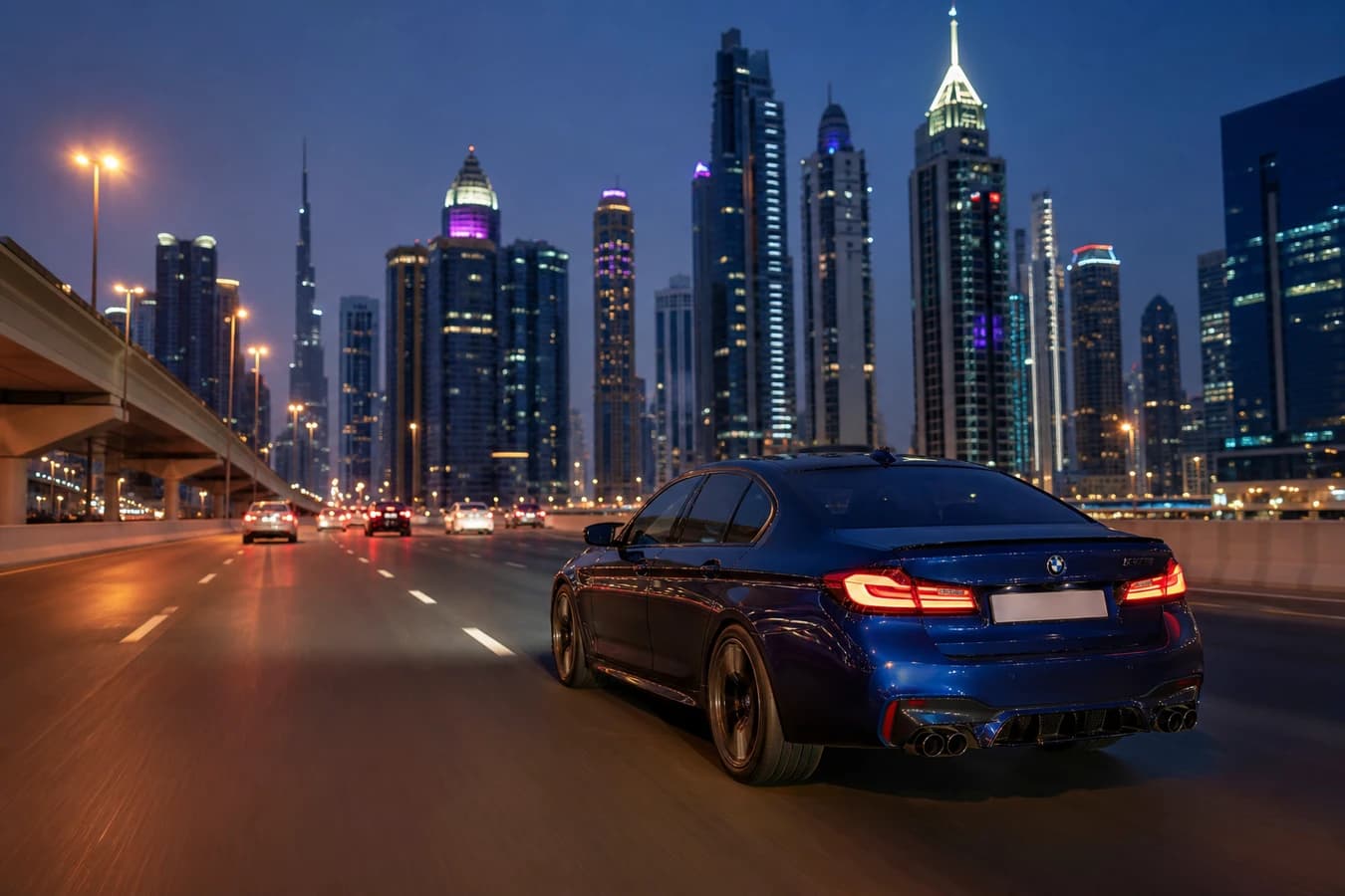 Sheikh Zayed Road luxury car rental: BMW M5 Sedan on the Dubai expressway at blue hour