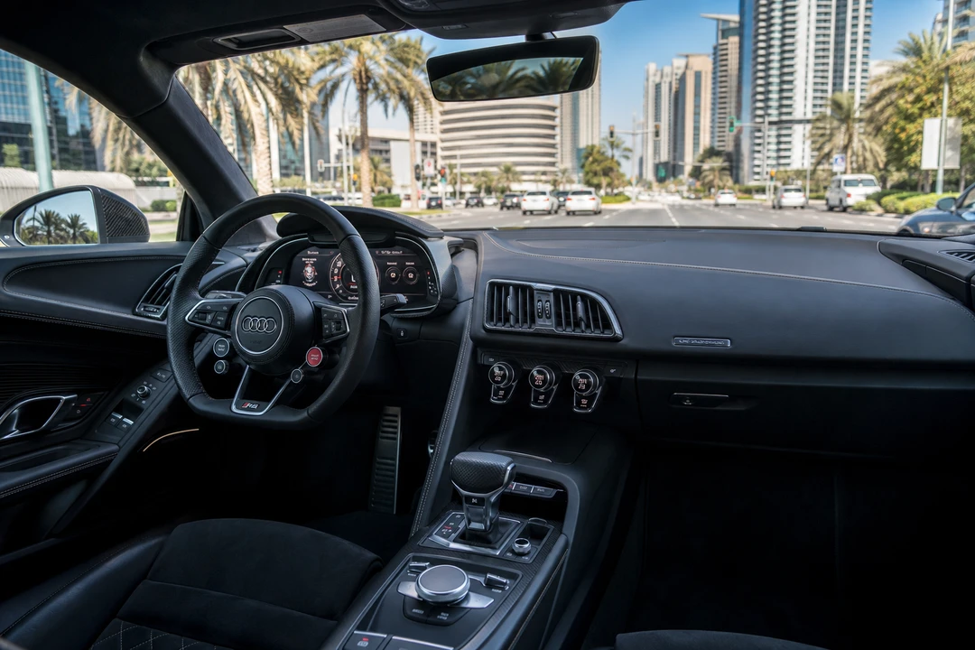 Audi R8 virtual cockpit and flat-bottom wheel for Audi R8 hire Dubai everyday cabin use