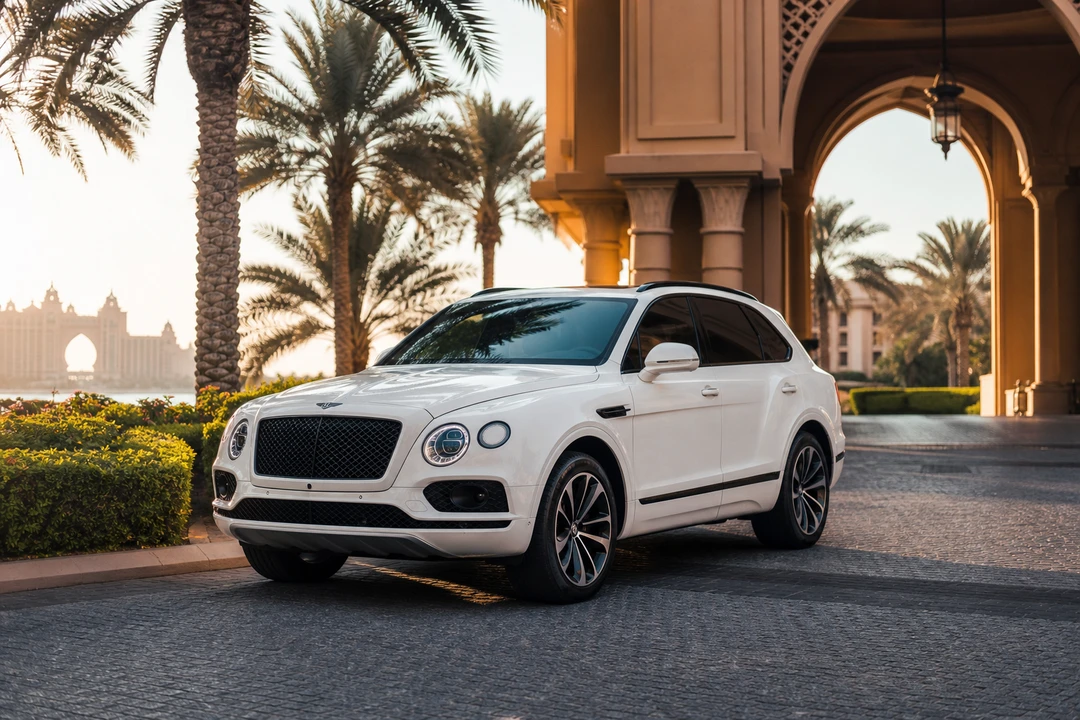 Bentley Bentayga at Palm Jumeirah resort entrance for city and resort luxury SUV plans