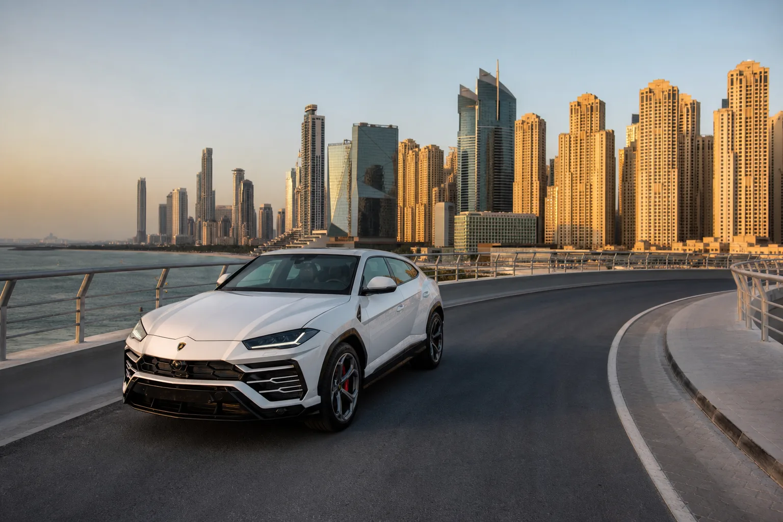Lamborghini Urus on the Bluewaters Island access bridge toward JBR for Dubai car delivery