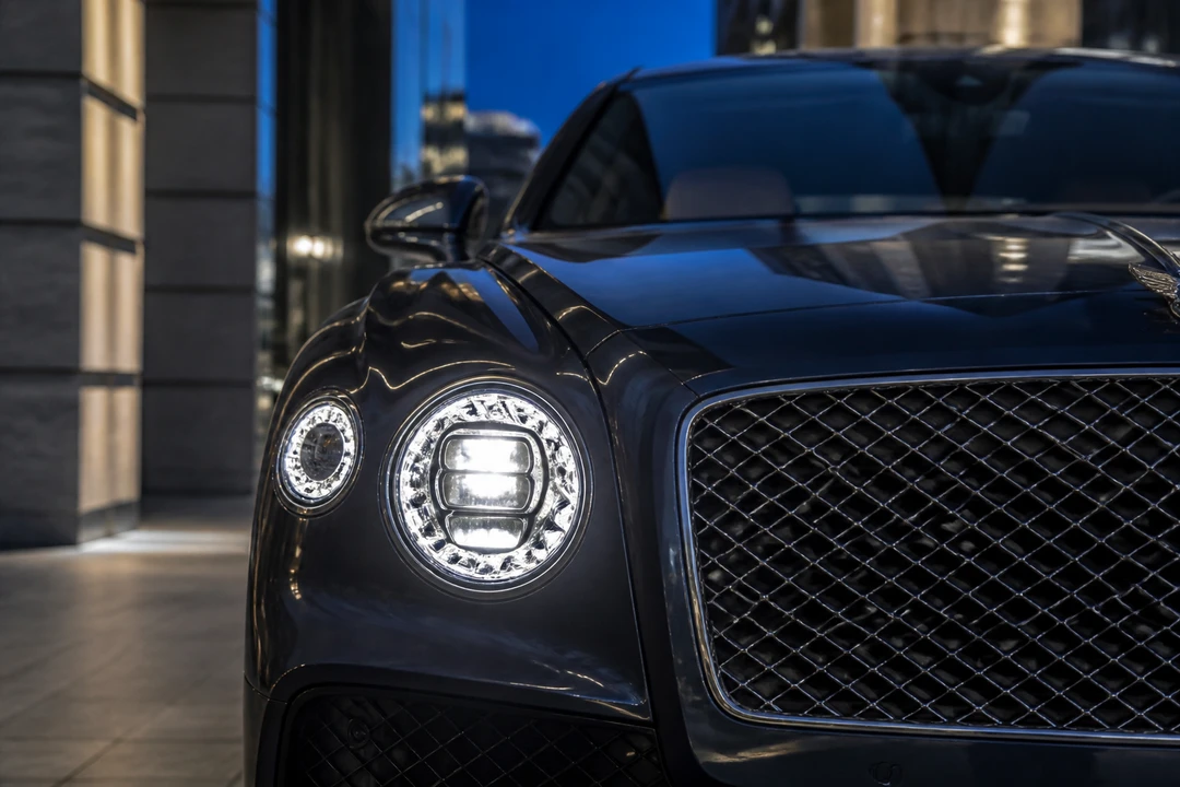 Bentley Flying Spur headlight against City Walk architecture for luxury car rental City Walk Dubai