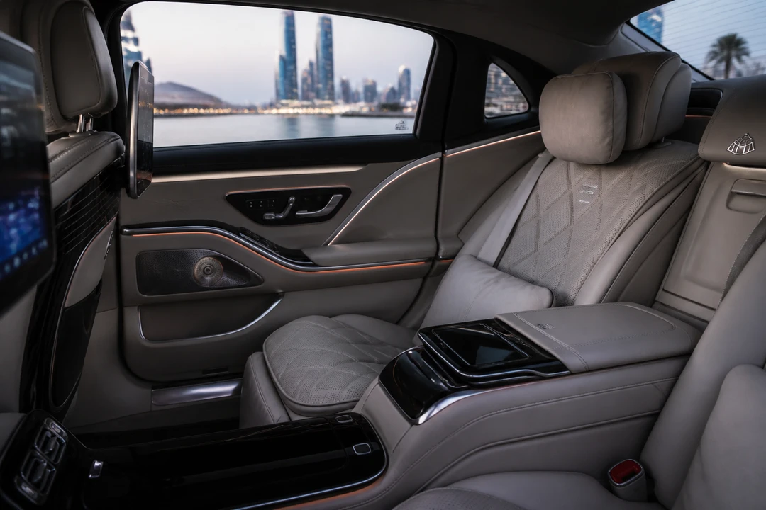 Maybach rear cabin for sedan rental Creek Harbour with creek-side tower views through the windows