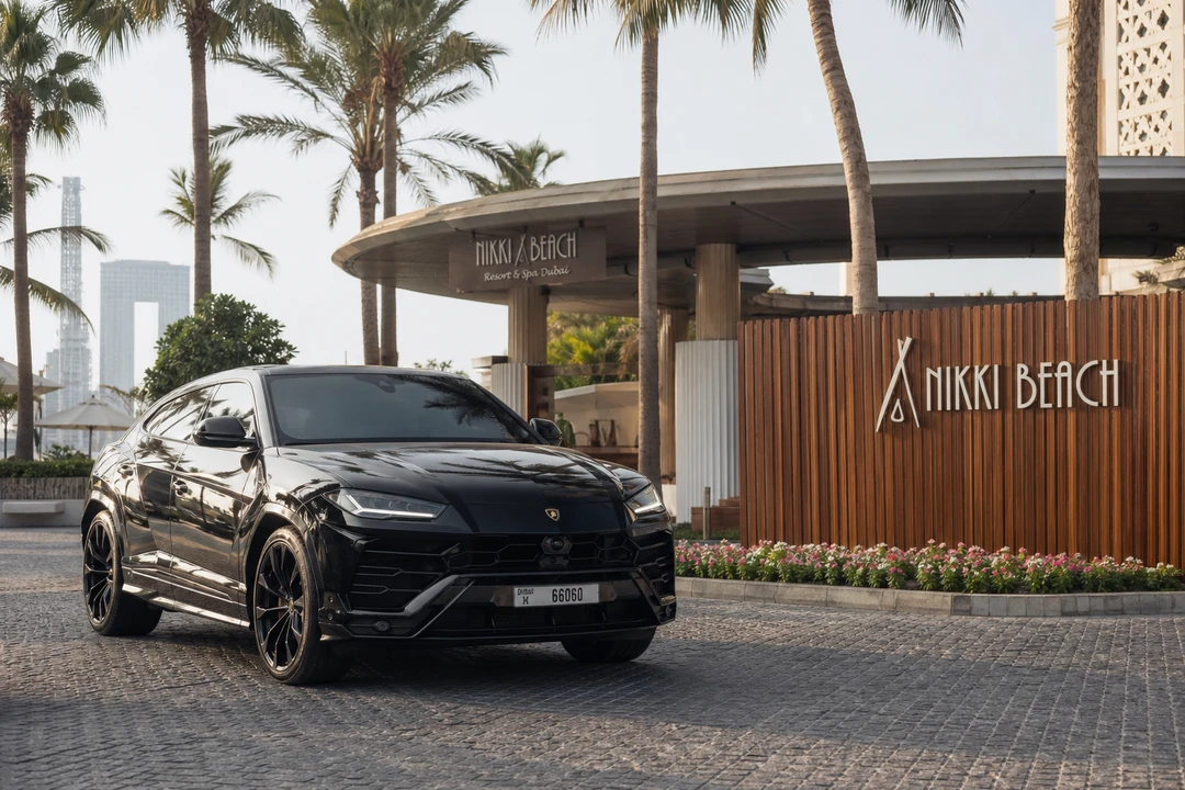 Lamborghini Urus at a JBR beach club valet for luxury SUV JBR weekend stays